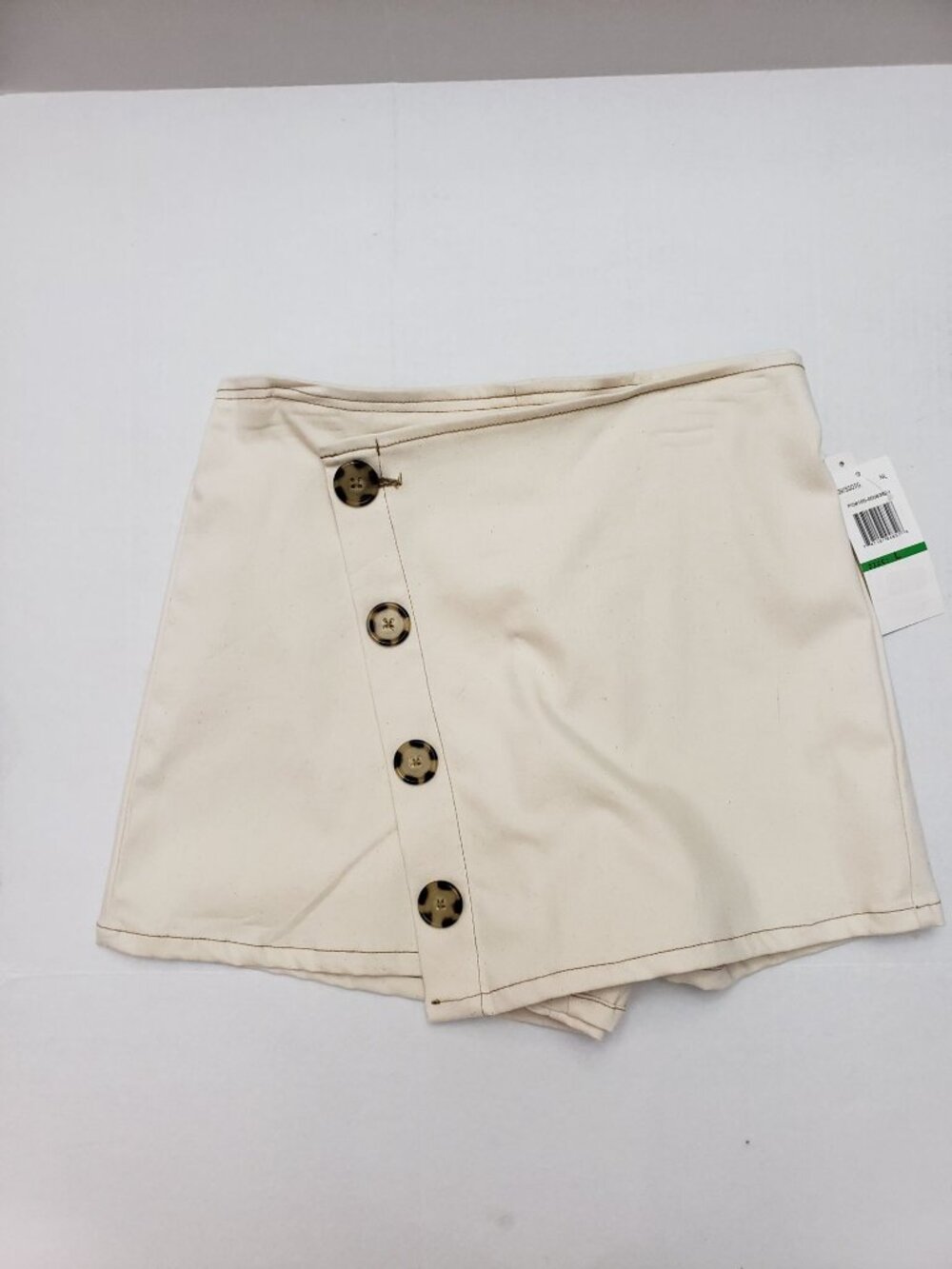 Takara Girls - cream color skort, size large